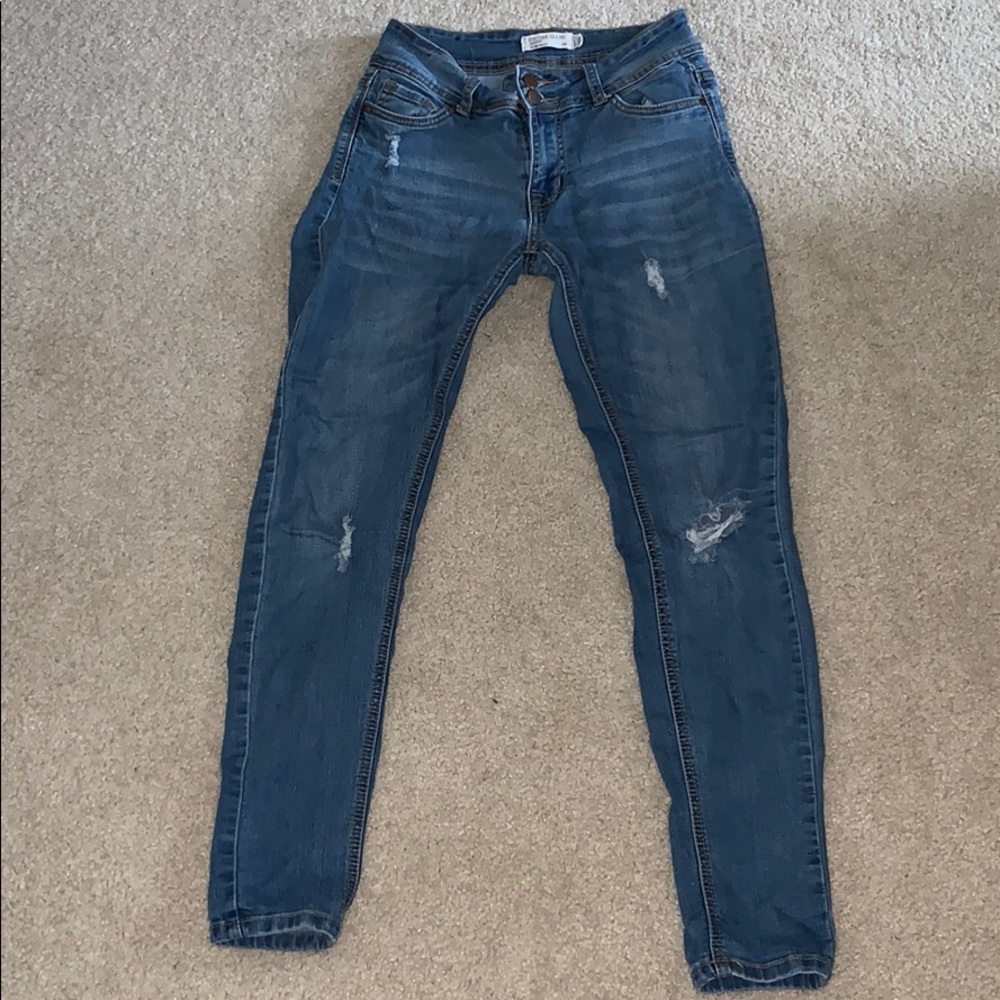 Lightly Distressed Medium Wash Skinny Jeans